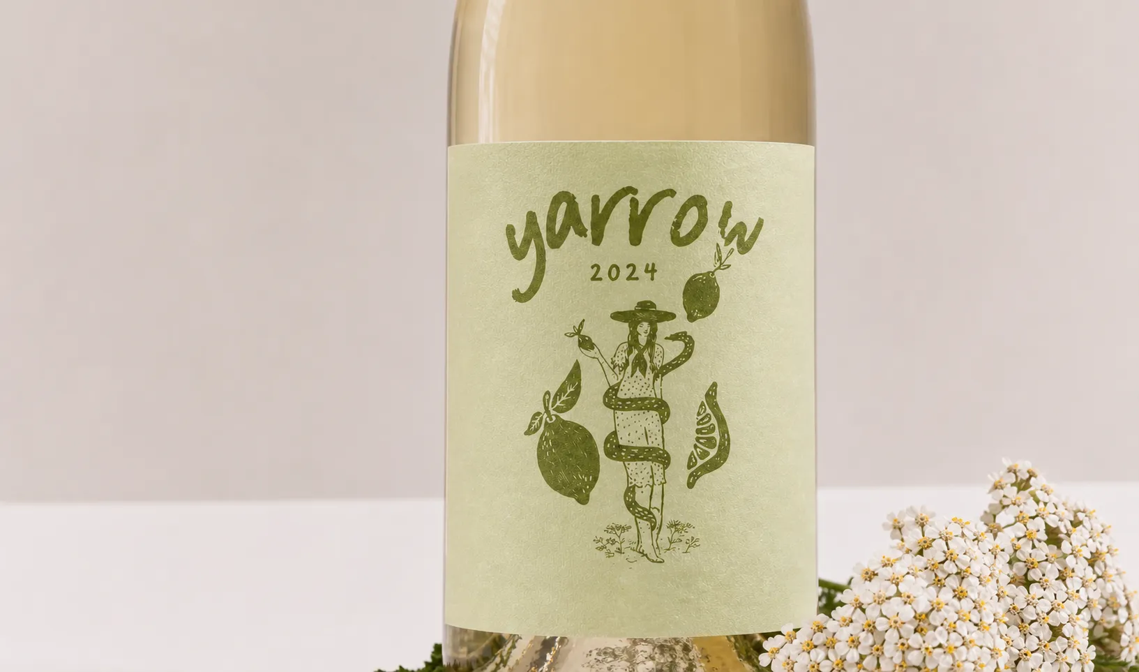 Yarrow 2024 Sauvignon Blanc bottle label close-up with unified dark olive illustrated label and white yarrow flowers