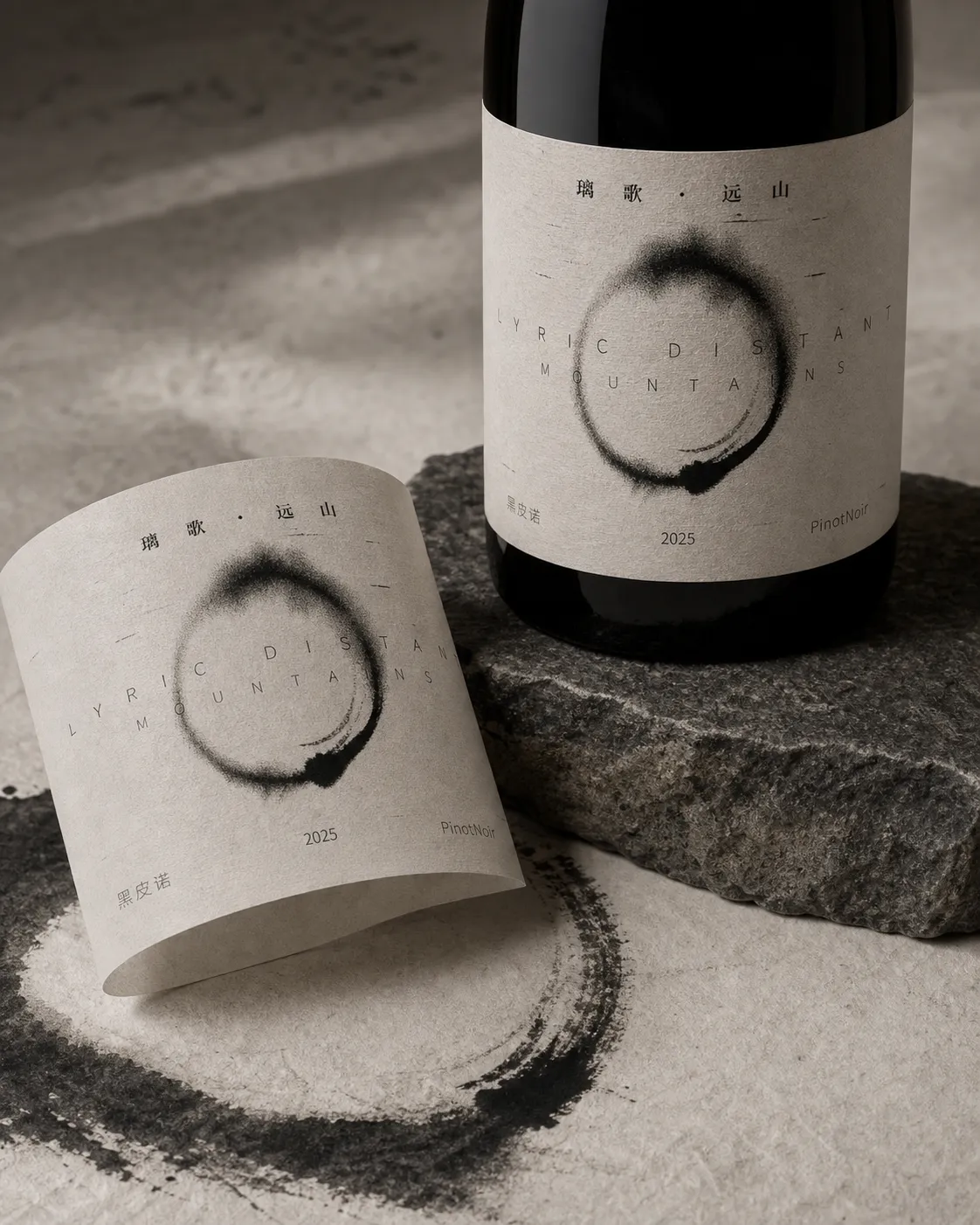 Lige Yuanshan Pinot Noir bottle and loose paper label on stone with ink circle texture